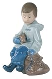 NAO BY LLADRO BOY RESTING ON EXCURSION