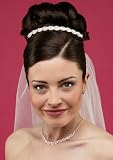 Jasmine Tiara: Brilliant Austrian Crystal Rhinestones are Encrusted Along a Criss-Cross Pattern For a Modern and Elegant Look