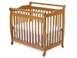 Emily Mini Crib in Honey Oak Finish By Da Vinci Baby Furniture