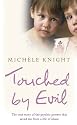 Touched by Evil: The True Story of the Psychic Powers That Saved Me from a Life of Abuse