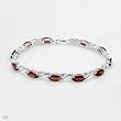 Bracelet With 13.20ctw Genuine Garnets 925 Sterling silver. Total item weight 12.9g Length 7.75in