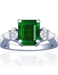Platinum Emerald Cut Emerald Three Stone Ring