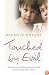 Touched By Evil: A Childhood Survived Against All Odds