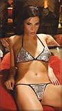 Super Sexy String Bra Top and a Matching String Tie Thong Trimmed in Sequins. One Size in Silver.