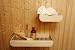 Saunaablage VARIO  Auch hier gilt:  Formsch�n, Individuell einsetzbar und Stilvoll f�r jede Sauna. 
Die Ablage aus TulipWood ( Pappel ) gibt es in 3 Breiten und findet daher immer seinen Platz.   Der 
Clou: Stell mich auf den Kopf ! Und all die vielen Kleinigkeiten sind sicher aufbewahrt. Durch 
einfaches l�sen der Schrauben l�sst sich die Aufh�ngung drehen und die Ablage individuell aufh�ngen. 
Und jeder Badelatschen steht im Trockenen.   Abmessung:  VARIO 1 B x H x T mm 300 x 300 x 80 mm  
VARIO 2 B x H x T mm 600 x 300 x 80 mm  VARIO 3 B x H x T mm 900 x 300 x 80 mm  - ohne Dekoration 
-Art: VARIO 1,