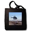A helicopter delivers barrels of fuel - Black Tote Bag 14w X 14h X 3d
