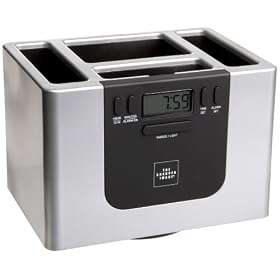 Click here to buy Sharper Image Rotating TV Organizer with Clock by Sharper Image.