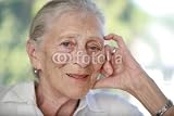 Wallmonkeys Peel and Stick Wall Decals - Close-up Portrait of Senior Woman Contemplating. Shallow Dof. - Removable Graphic