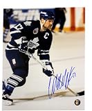 Wendel Clark Autographed Toronto Maple Leafs Blue Jersey Vertical 8x10 Photo (Frozen Pond Auth)