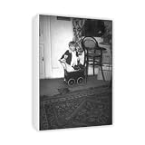 Little boy with a toy pram - Canvas - Medium - 30x45cm