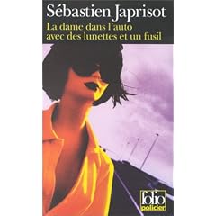La Dame Dans l'Auto Avec DES Lunettes Et UN Fusil
