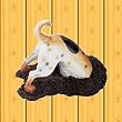 Toby the terrier statue playfull dog digging sculpture