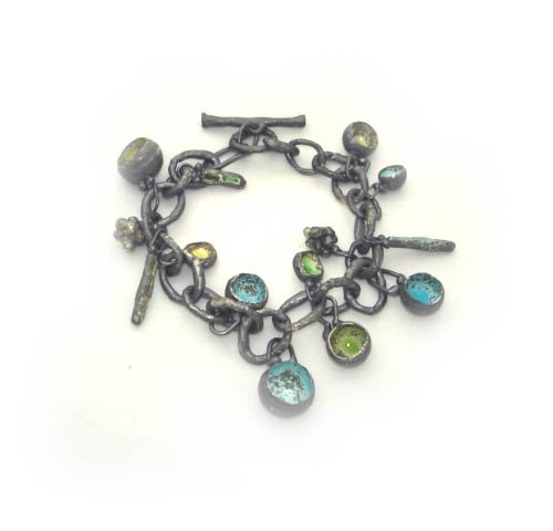 Contemporary sterling silver oxidised charm bracelet with hand beaten chain & enamelled multi coloured pendents