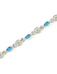 14kt Yellow Gold Oval Blue Topaz and Diamond Bracelet