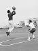 Comedian Bill Cosby Shooting Ball Against His Press Agent, Joe Sutton, During Game of Basketball Premium Photographic Poster Print