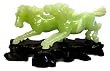 Genuine hand carved jade horses running in the wind, fitted wood stand included