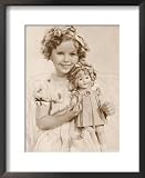 Shirley Temple American Child Star of the 1930s Seen Here with a Shirley Temple Doll Framed Art Poster Print, 18x22