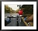 View over the Handlebars of a Bicycle Speeding along a Vermont Road Framed Art Poster Print by Skip Brown, 31x25