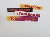 Gift Pack Of Four Toblerone Chocolate Candy Bars - 1 Each Milk Chocolate Fruit & Nut Bar, Milk Chocolate, White Chocolate & Dark Chocolate Honey Almond Nougat (3.52 oz)