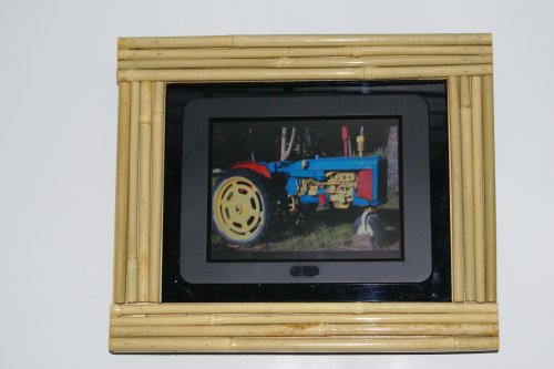 Voclan Digital Photo Frame 8LCD by SHARP. Includes 8x10 bamboo looking frame. Fits most 8x10 picture frames for future decor changes.Superior 800x600 resolution. Plug  Play (No computer needed for digital photos=no viruses). Play MP3  videos.
