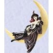 medieval witch statue in gothic crescent moon sculpture