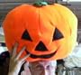GIANT 18-INCHES-LONG, SOFT STUFFED PLUSH PUMPKIN PILLOW - HALLOWEEN GIFT, PROP, TOY AND DECORATION. AMERICAN MADE IN THE USA AMERICA