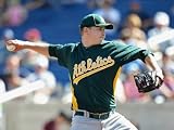 Oakland Athletics v Milwaukee Brewers, PHOENIX, AZ - MARCH 03: Trevor Cahill Photographic Poster Print by Christian Petersen, 9x12