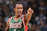 Milwaukee Bucks v Denver Nuggets: Brandon Jennings Photographic Poster Print by Garrett Ellwood, 12x18