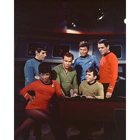 JAMES DOOHAN AS LT. CMDR. MONTGOMERY 'SCOTTY' SCOTT, DEFOREST KELLEY AS LT. CMDR. LEONARD H. 'BONES' MCCOY, M.D., WALTER KOENIG AS ENSIGN PAVEL CHEKOV, NICHELLE NICHOLS AS LT. NYOTA UHURA, LEONARD NIMOY AS LT. CMDR./COMMANDER SPOCK, WILLIAM SHATNER AS CAPTAIN JAMES T. KIRK FROM STAR TREK #1 - COLOUR Movie Photo - (4 Different Photograph & POSTER Sizes Available)