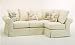 2 pc slip covered sectional sofa with pillow back and rolled arms