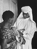 Sister Joseph Theresa Caring For Child Sick from Hunger Photographic Poster Print by Terence Spencer, 18x24