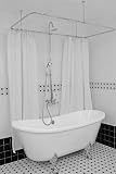 Classique HLBT67 Bateau Clawfoot Tub - With Wall Mount Faucet and Shower, Shower Curtain Enclosure, Drain and Heavy Cast Ball & Claw Feet in Chrome. The tub faucet and shower is all brass construction and is supplied with a handheld shower.