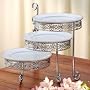 SWIVELING CAKE SERVERS - 3 SWIVELING SILVERPLATED CAKE SERVERS - cake stand
