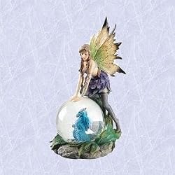 The fairy and her dragon statue snow globe sculpture