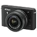Nikon 1 J1 Systemkamera (10 Megapixel, 7,5 cm (3 Zoll) Display) schwarz inkl 1 NIKKOR VR 10-30 mm Objektiv
