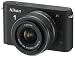 Nikon 1 J1 Systemkamera (10 Megapixel, 7,5 cm (3 Zoll) Display) schwarz inkl 1 NIKKOR VR 10-30 mm Objektiv