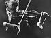 All Products : Close Up of Violinist Jascha Heifetz Playing in Mili's Darkened Studio Premium Photographic Poster Print