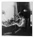 Historic Print (L): Boy working with electrical apparatus [telegraph]