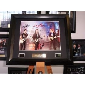 U2 Signed autograph photo and film cell memorabilia