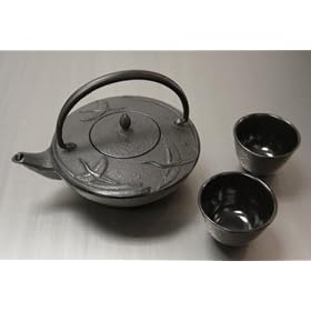 Click here to buy Japanese Cast Iron Tea Pot Set Black Crane by Kafu.