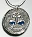This extremely versatile amulet has two standard uses. It can be worn to protect and repell any unwanted influences, or can instead be hidden upon your foe or in their domain as a focus for attacks. Approximately 1 1/8" diameter, it comes on a silvertone chain.
