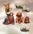 Polyresin Nativity Village - Villagers - 7 Piece Set - Figure 4.5" Tall - Villager, Villager With Pottery, Angel, and Sheep