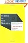 Hiding in the Mirror: The Mysterious Allure of Extra Dimensions, from Plato to String Theory and Beyond