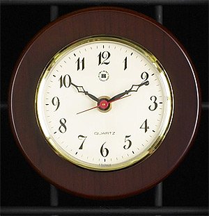 Brass Quartz Clock on Cherry Wood