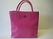 Guess Harpo Patent Tote in Fuchsia