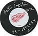 Metro Prystai autographed Hockey Puck (Detroit Red Wings)