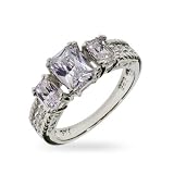 Past, Present and Future Emerald Cut Three Stone Ring