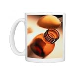 Spoonful of cough medicine and a medicine bottle Photo Mugs