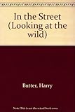 Looking at the wild with Harry Butler. In the street
