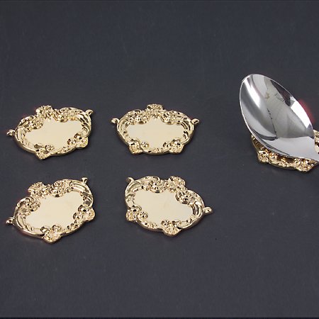 SET OF 12 GOLD SPOON RESTS*